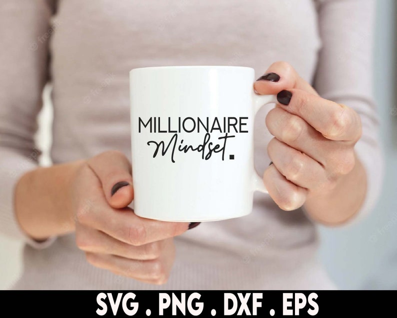 May include: White ceramic mug with black text that reads "Millionaire Mindset".