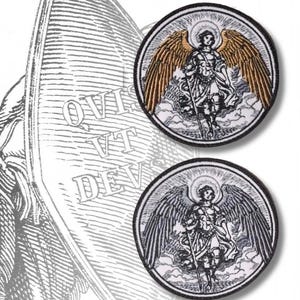 May include: An illustration of Saint Michael the Archangel, holding a sword and shield. The shield has the text "QUI UT DEUS". Two embroidered patches of the Archangel are also shown, one with gold wings and one with silver wings.