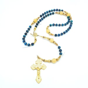 Blue Catholic Rosary. Handcrafted made to order. Made with real natural cat eye beads and gold plated spacer beads. Durable Rosary
