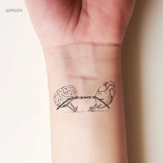 Bea Miller Anatomical Heart, Brain Upper Arm Tattoo | Steal Her Style