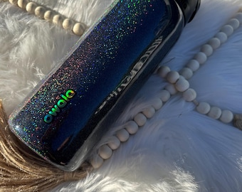 Custom owala dark dark freesip water bottle with black/ rainbow holographic glitter. Made to order