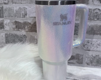 Authentic Stanley tumbler with iridescent opal color shift glitter added to the frost Stanley