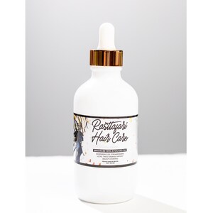 Rastta Locs Growth and Anti-itch Oil with rosemary, mint, juniper berry essential oils. Light dreadlock oil for locs, braids, twists.