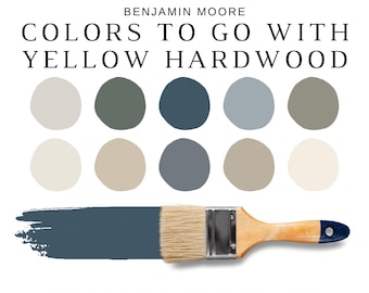 May include: A paint color palette with the text "COLORS TO GO WITH YELLOW HARDWOOD" and "WHOLE HOUSE - PAINT COLOR PALETTE". The palette includes various shades of blue, green, and neutral colors, with a paintbrush displaying a swatch of blue paint.
