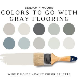 May include: A Benjamin Moore paint colour palette with the text "COLORS TO GO WITH GRAY FLOORING." The image displays a paintbrush with a light grey stroke and ten paint swatches in shades of grey and blue. The palette is designed for whole house use.