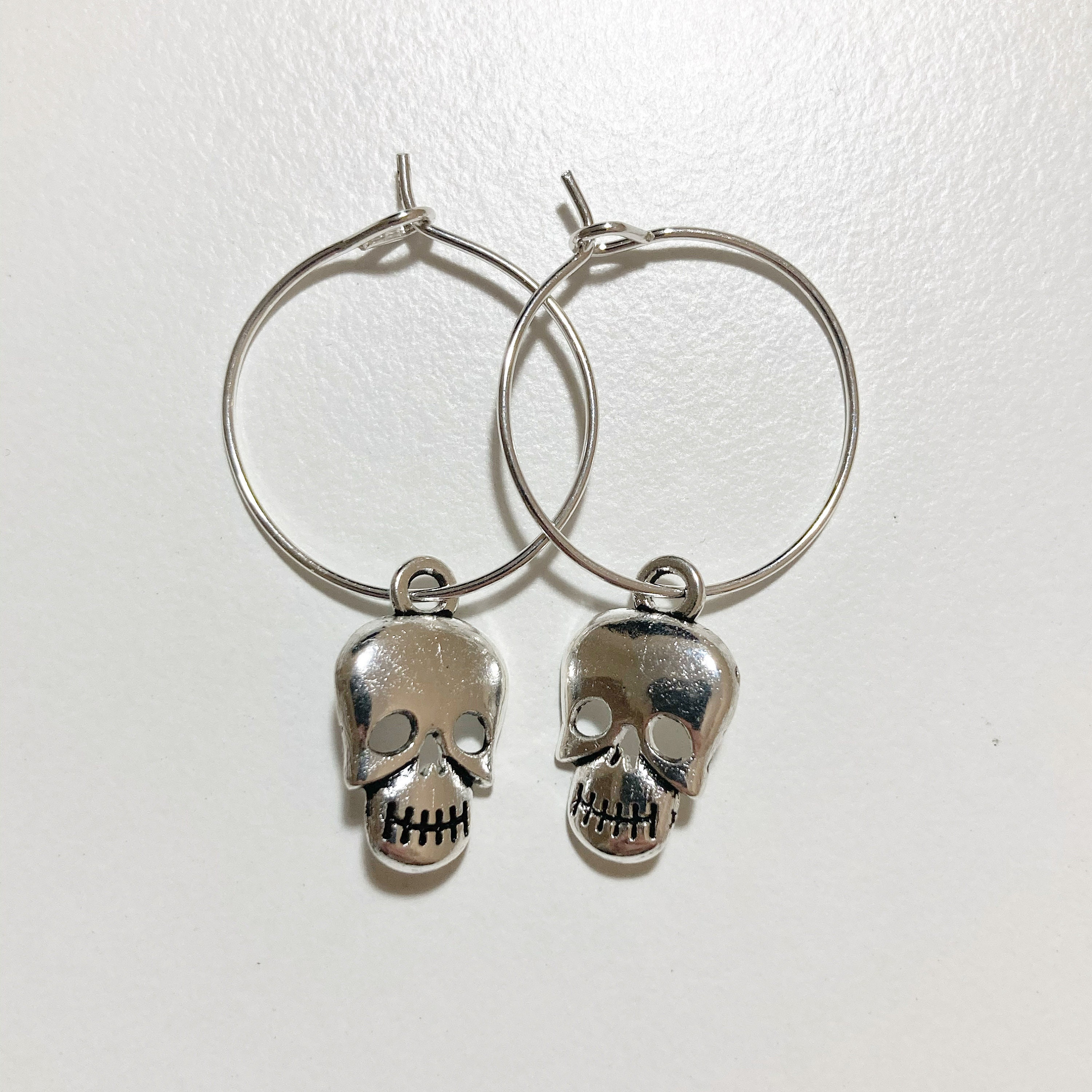 Handmade silver skull hoop earrings | Etsy