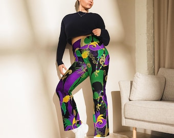 Leggings acampanados negros con estampado integral de flores de lis y máscaras de Mardi Gras