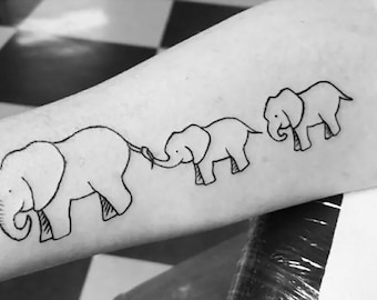 ElephantandBabyNeckTattoo  Daniel Borrelli  Flickr