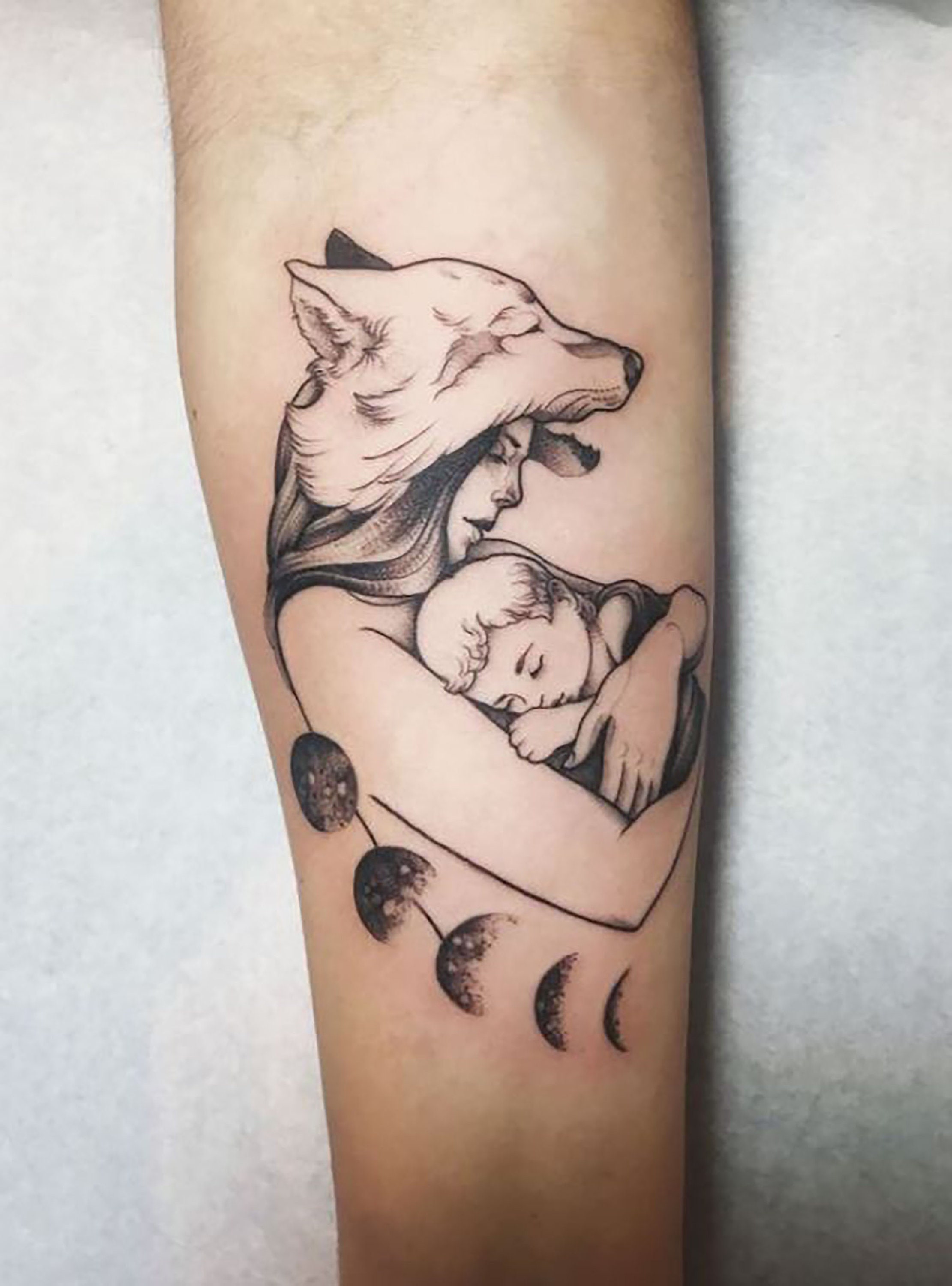 Momma wolf and baby wolf tattoo - Tattoogrid.net