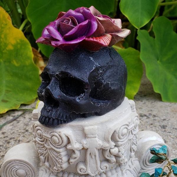 Skull figure with roses