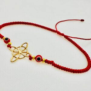 nudo de bruja pulsera roja con ojito cada lado potente amuleto para protección y buena fortuna