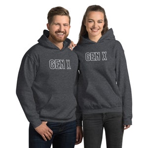 May include: Two dark grey hooded sweatshirts with white outlined text. The text on the sweatshirts reads "GEN X".