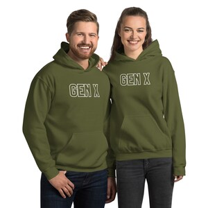 May include: Two green hooded sweatshirts with white text that says "GEN X" on the front.