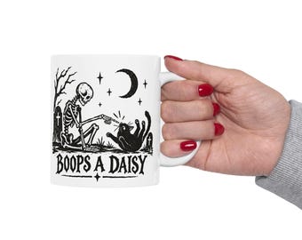 Boops A Daisy | Goth Black Cat Skeleton Mug Cemetery Goth Halloween Pet Mug Goth Gift