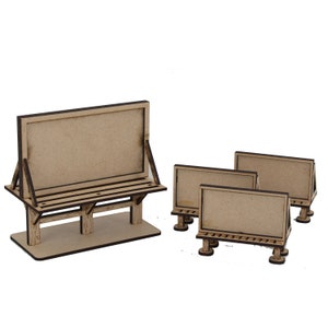 May include: A set of four wooden blank signs, perfect for crafting and DIY projects. The signs are made of unfinished wood and have a rustic look. The set includes one large sign with a bench and three smaller signs.
