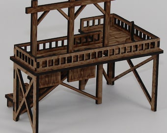 May include: A wooden model of a raised platform with a wooden railing and a wooden frame above. The platform has a wooden staircase leading up to it.