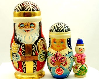 Christmas / New years toys / Matreshka / Dolls / Magic Santa Claus / Handpainted stacing dolls / 3 places for a gift / Christmans ornaments