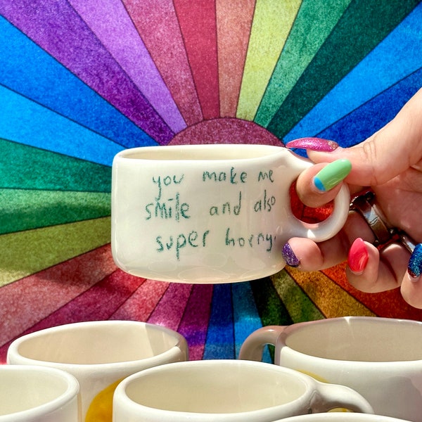 Handmade ceramic smiley mug with handle