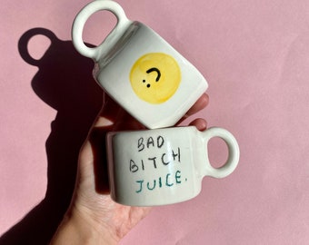 Handmade ceramic bad mug with handle