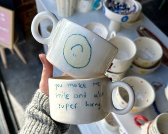 Handmade ceramic smiley mug with handle