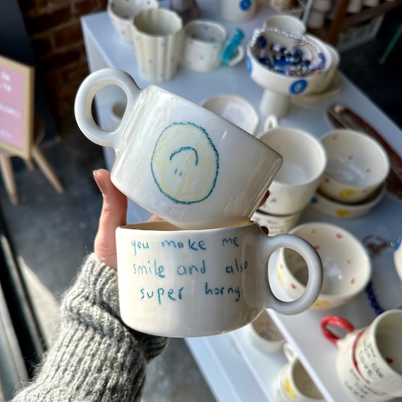 Handmade ceramic smiley mug with handle