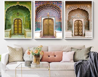 May include: Three framed prints of ornate doorways with intricate details. The doorways are arched and have decorative carvings and patterns. The middle doorway has a peacock design above it.