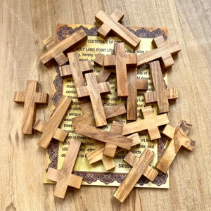 Small olive wood crosses. Holy Land crosses. Olive wood crosses. Wooden crosses. Retail. Gift version. Bethlehem crosses.