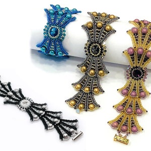 May include: Four beaded bracelets in various colors: blue, gold, black and white, and gold with pink. Each bracelet features intricate beadwork with pearl and crystal accents, and a clasp closure.