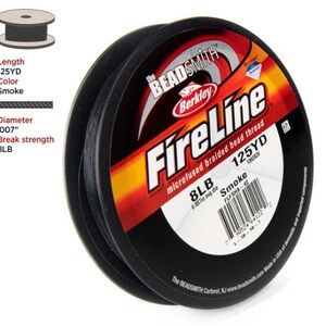May include: A spool of black FireLine microfused braided bead thread by Berkley. The spool is labeled with the brand name, product name, and specifications, including 125 yards, 8lb test, and smoke color.