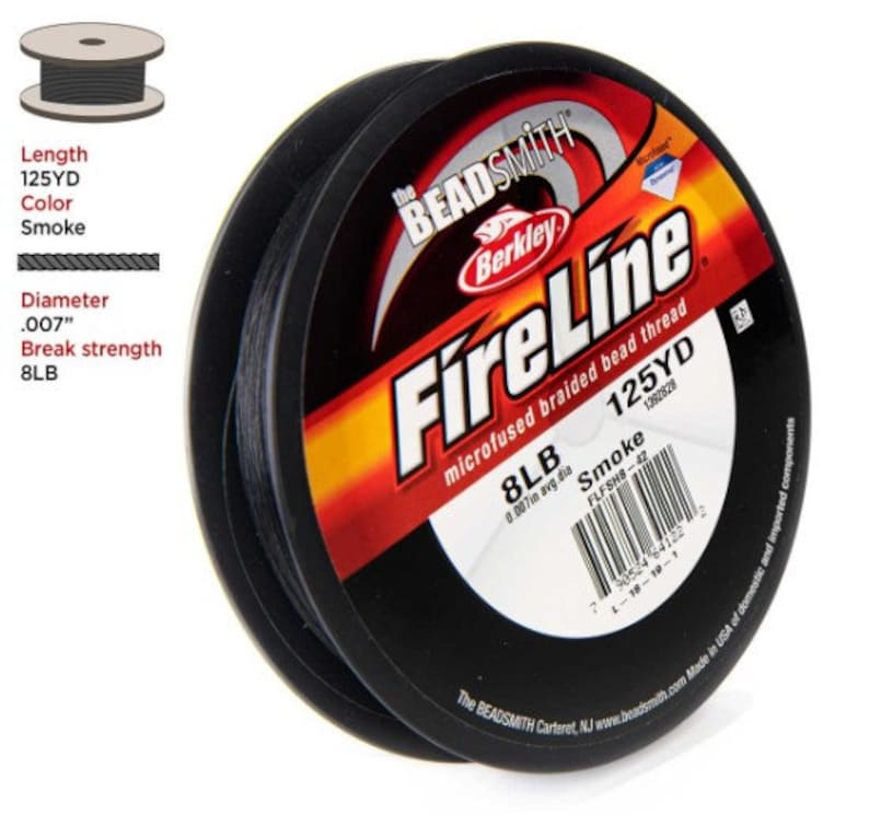 May include: A spool of black FireLine microfused braided bead thread by Berkley. The spool is labeled with the brand name, product name, and specifications, including 125 yards, 8lb test, and smoke color.