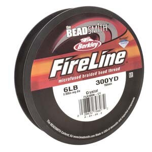 May include: A spool of Berkley FireLine microfused braided bead thread fishing line in crystal color. The spool is black with white text and a red and yellow logo. It is 6lb test and 300 yards long.