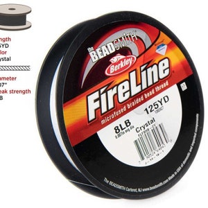 May include: A spool of white FireLine microfused braided bead thread by Berkley. The spool is labeled with the brand name, product name, and details like 125 yards, 8lb test, and Crystal color.
