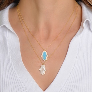 Upside down hand pendant deals
