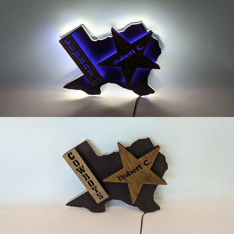 May include: A wooden Texas state outline with a blue star and the text "Robert C." and a wooden sign with the text "Cowboys" on the side. The state outline is lit up with a white light.