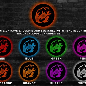 May include: A neon sign with a bear design in 13 different colors, including red, blue, green, pink, red orange, orange, purple, and white. The sign is controlled by a remote control.