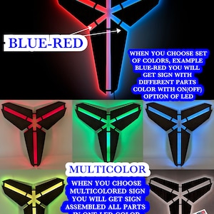 May include: A wooden sign shaped like the Kobe Bryant logo with LED lights. The sign can be lit in blue and red, green, or multiple colors. The sign comes with a remote control to change the colors.