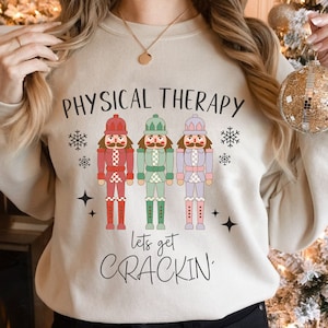 Physical Therapy Christmas Sweatshirt, Physical Therapist Xmas Gift, Physical Therapy Assistant Crewneck, Hoodie, Lets Get Crackin, Funny