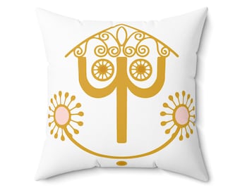 May include: White throw pillow with a gold embroidered design of a stylized tree with a crown on top. The tree has two circular designs on the sides and two smaller stylized flowers on either side of the tree.