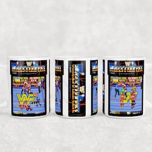 May include: White ceramic coffee mug with a colorful image of a wrestling video game scene. The image features wrestlers in a ring with the text "WWF Wrestlefest" at the top.