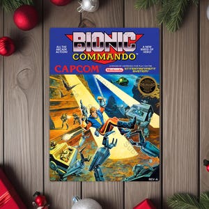 May include: A Bionic Commando video game cartridge with a colorful action scene. The cartridge features the game's title, logo, and the Capcom and Nintendo logos. The background includes Christmas decorations.