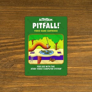 Pitfall! Atari 2600 Box Cover Video Game image on a Fridge Magnet 2.5"x3.5" Metal Plate - High gloss - Image is sublimated into the plate