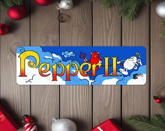 Pepper II Arcade Game Marquee image on a 4"x13.5" Metal Plate - High gloss w/ rounded corners - Image is sublimated into the metal plate