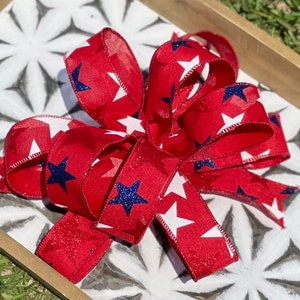 Patriotic Red White and Blue Stars on Canvas Ribbon. 1.5 inch ribbon with 10 loops 14.00