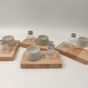 Concrete egg cup set on beech wood boards