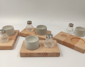 Concrete egg cup set on beech wood boards