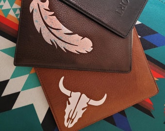 Leather passport travel wallet/holder with rustic designs: cow skull or feather