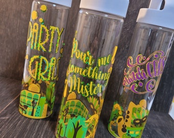 Mardi Gras glass water bottle with scenes of New Orleans and custom vinyl