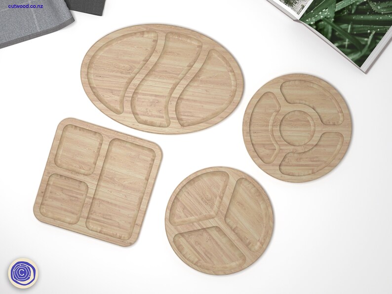May include: Four wooden serving trays with different shapes and compartment configurations. The trays are made of light brown wood and have a natural wood grain finish.