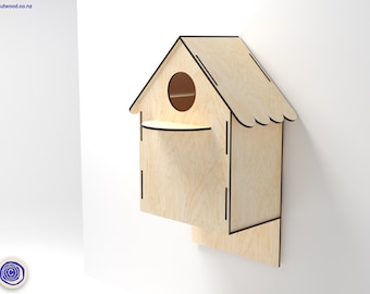 May include: A wooden birdhouse with a small opening for birds to enter. The birdhouse is painted a light brown color and has a small shelf underneath the opening.