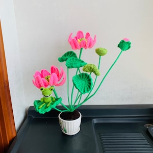 May include: A set of three ceramic mugs with a speckled, matte finish. Each mug features a different color: light blue, cream, and gray. The mugs have a simple, modern design and a comfortable handle.